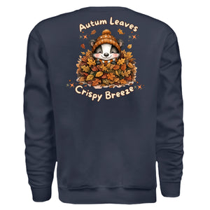 Autumn Leaves Graphic Sweatshirt featuring a cute animal in a pile of leaves on the back, perfect for fall vibes.